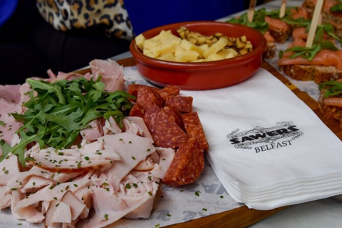 Belfast Centre Food Tour of 12+ Local Irish Dishes & Drinks - Entering central Belfast: City Hall and the first real bites