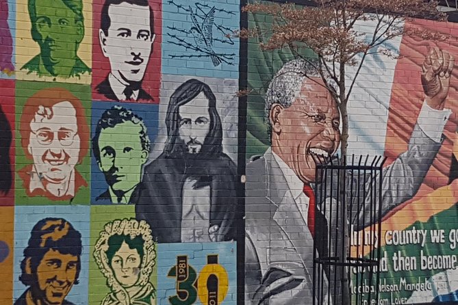 Belfast Troubles Murals Street Art and Peace Wall Walking Tour - Peace Wall Stop: The Barrier Between Communities
