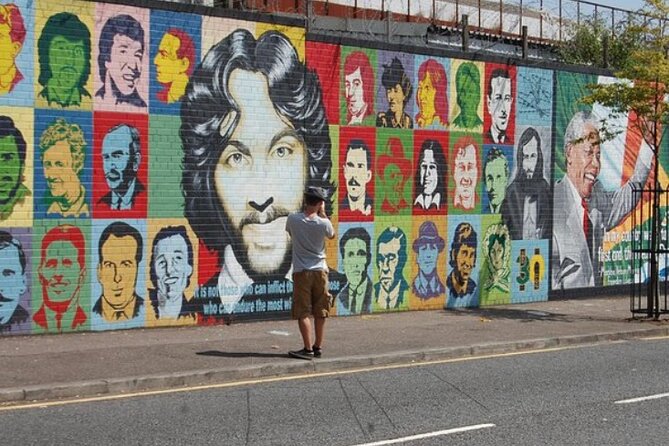 Cab Tours Belfast Famous Black taxi tours 2 hrs The Troubles - Stop 1 on the Falls Road: Bobby Sands mural and Bombay Street context
