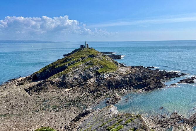 Cardiff: Gower Peninsula's Cliffs Scenic Day Tour - Mumbles: shops, seafront strolls, and Norman-era ruins nearby