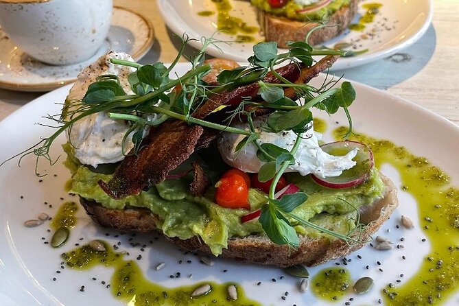 Chester Food Tour: Unique Food With Drinks & Sightseeing - Stop 2: Eastgate and the Eastgate Clock, photo time plus producer tastings
