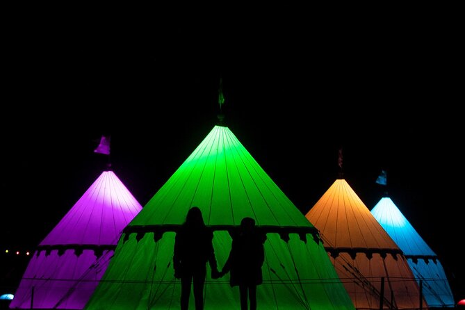Christmas at Warwick Castle - Light Trail & Ice Skating Packages - Nutcracker-style entrance, light trail gardens, and lake-side moments