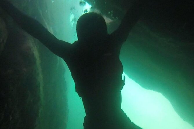 Coasteering Geopark Adventure In Torquay - Sea caves, ledges, and the stories that make the coastline click