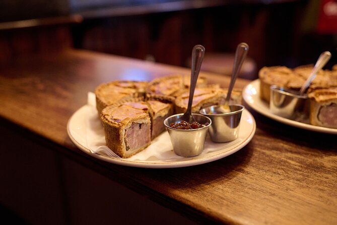 Devour London Historical Pub Tour:Traditional British Food & Ales - Stop 2: The Old Bell Tavern by Covent Garden, cider and sausage roll