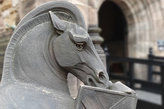 Edinburgh Castle Highlights Tour with Tickets, Map, and Guide - Hawkhill climb: prisons, today’s residents, and a fortress that still lives