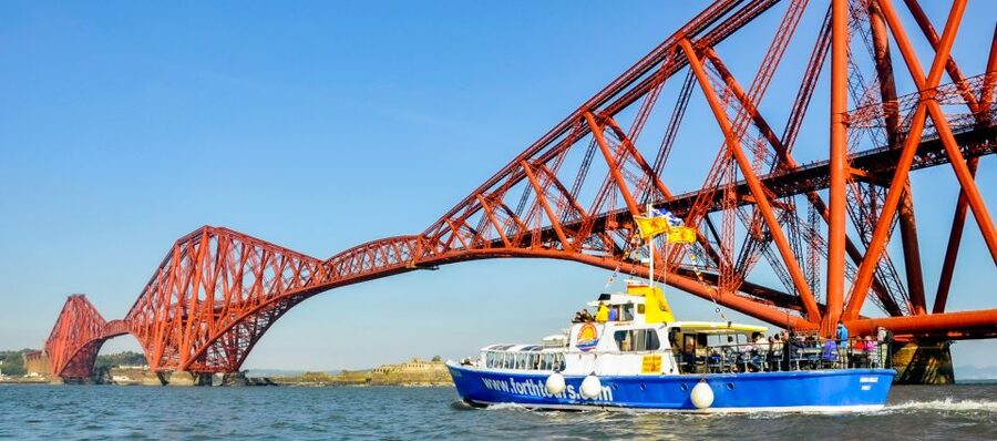 Edinburgh: 'Firth of Forth' Three Bridges Sightseeing Cruise - Onboard comfort: heated lounge, decks for photos, and a bar within reach