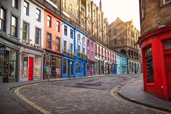 Edinburgh Full Day Walking Tour with Castle Included -Small Group - Royal Mile essentials: Mercat Cross, St Giles, and the places punishment shaped