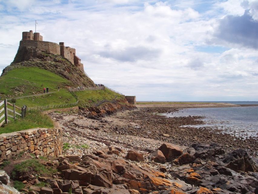 From Edinburg: Viking Coast & Alnwick Castle Day Tour - Bamburgh Castle views and the Farne Islands from the coast