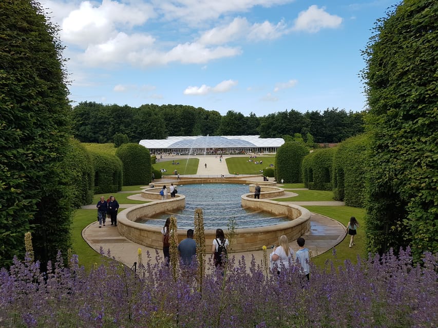 From Edinburgh: Holy Island, Alnwick Castle & Northumbria - Alnwick Gardens: Grand Cascade and the Poison Garden tours