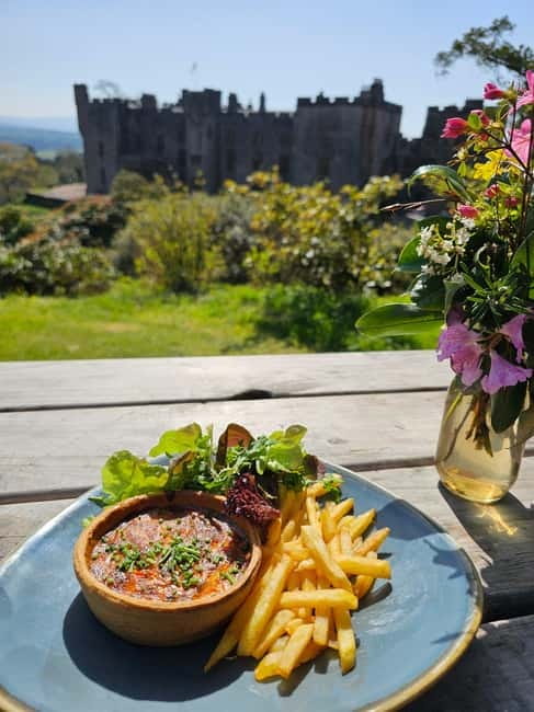 From Windermere: Mountain Passes & Muncaster Castle - Muncaster Castle: Lunch, Bird of Prey Show, and Medieval Weapons Hall
