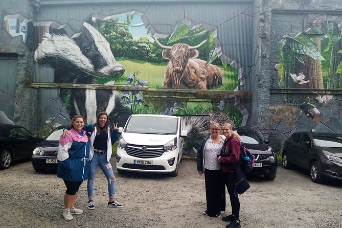 Glasgow Street Art Daily Walking Tour: 2pm - Falling lovers by the Rebel Bear, then Smug’s wildlife mural