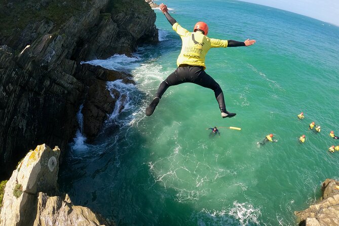 Half-Day Coasteering in Newquay Cornwall - Entering the Cornish Coast at Fistral Beach