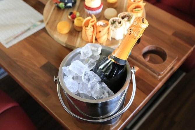 London Afternoon Tea Bus with Panoramic Tour - Upper-deck seating: your best views come with a first-come rule