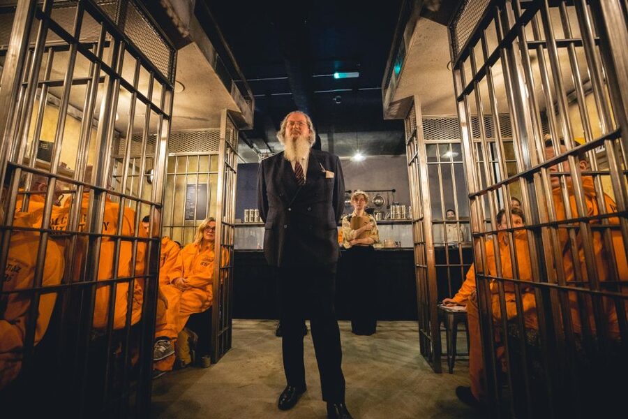 London: Alcotraz Immersive Prison Cocktail Experience Ticket - Entering Cell Block Two-One-Two, Metal Detector Check-In, and the Jumpsuit Fit