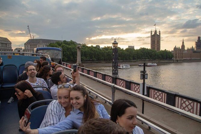 London by Night Sightseeing Open Top Bus Tour with Live Guide - The London Eye Stop: Views Without the Ticket Pressure