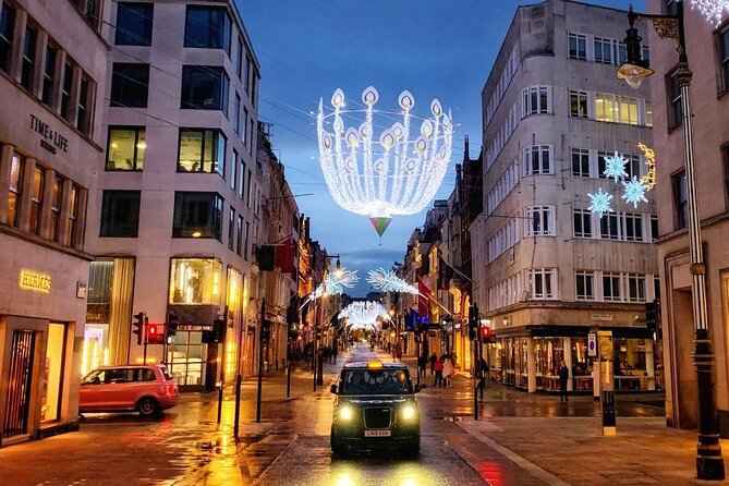 London Christmas Lights Guided Tour by Cab - Oxford Street, where the holiday lights hit shopping street on a grand scale