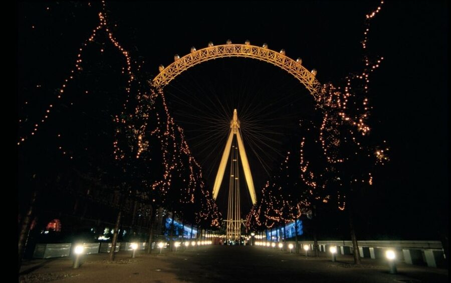 London: Christmas Lights Nighttime Bus Tour with Live Guide - London Eye skyline views that read like a winter postcard