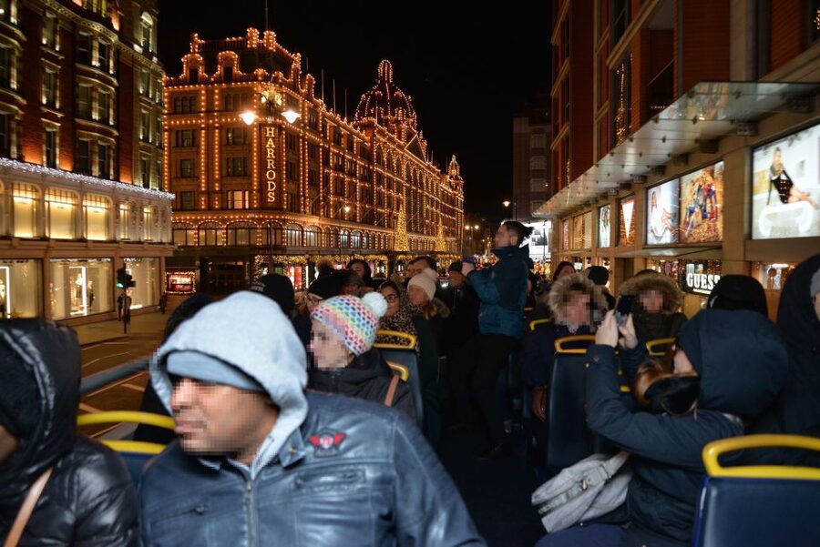 London: London by Night Sightseeing Open-Top Bus Tour - Harrods at night: window-lit theater energy