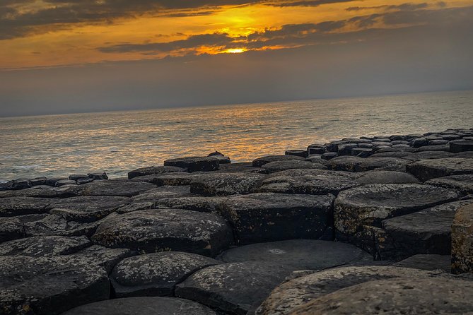 Luxury Giants Causeway Tour in Mercedes + FREE Belfast Mural Tour - Dunluce Castle and Dunseverick Castle: two ruins with very different time scales