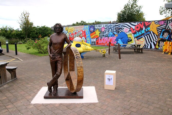 Private Beatles Car Tour, Penny Lane, Strawberry Field & childhood homes - Getting your bearings: starting at the Mersey Ferry Terminal statues