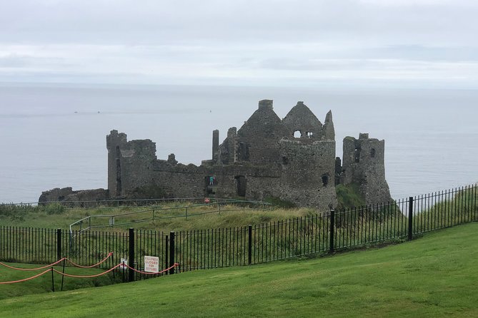 Private Giants Causeway & Antrim Coast Tour - Dunluce Castle: a dramatic ruin with a tight visit window