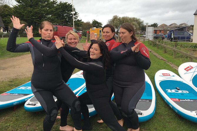 Stand Up Paddle Boarding Journey Down Bude Canal - Getting kitted up: inflatable SUP, paddle, and wetsuit option