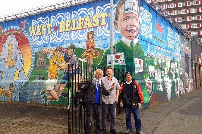 The Troubles and iconic award winning taxi 2hr private cab tour - The walls still speaking: International Mural Wall, Peace Wall, Falls Library, and Shankill Graveyard