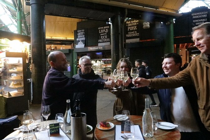 Walking Tour and Tasting at Indian Restaurant in London - The 1000-Year-Old Tower and a WWII Warship Museum Sighting